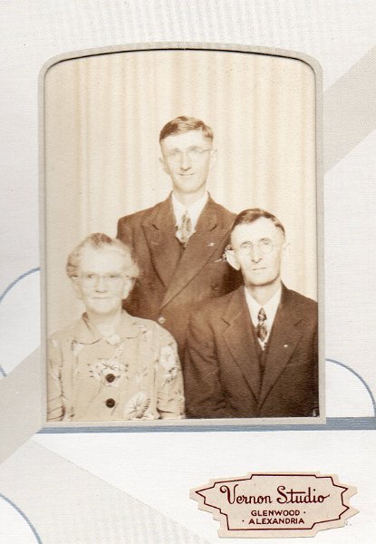 (A)   Michael Woida, 10-9-1885 to 8-13-1978; Gertrude S. (Peters) Woida, 12-20-1882 to 8-8-1949; Henry J. Woida, 11-20-1911 to 6-28-2003.  Studio is VERNON STUDIO, GLENWOOD-ALEXANDRIA